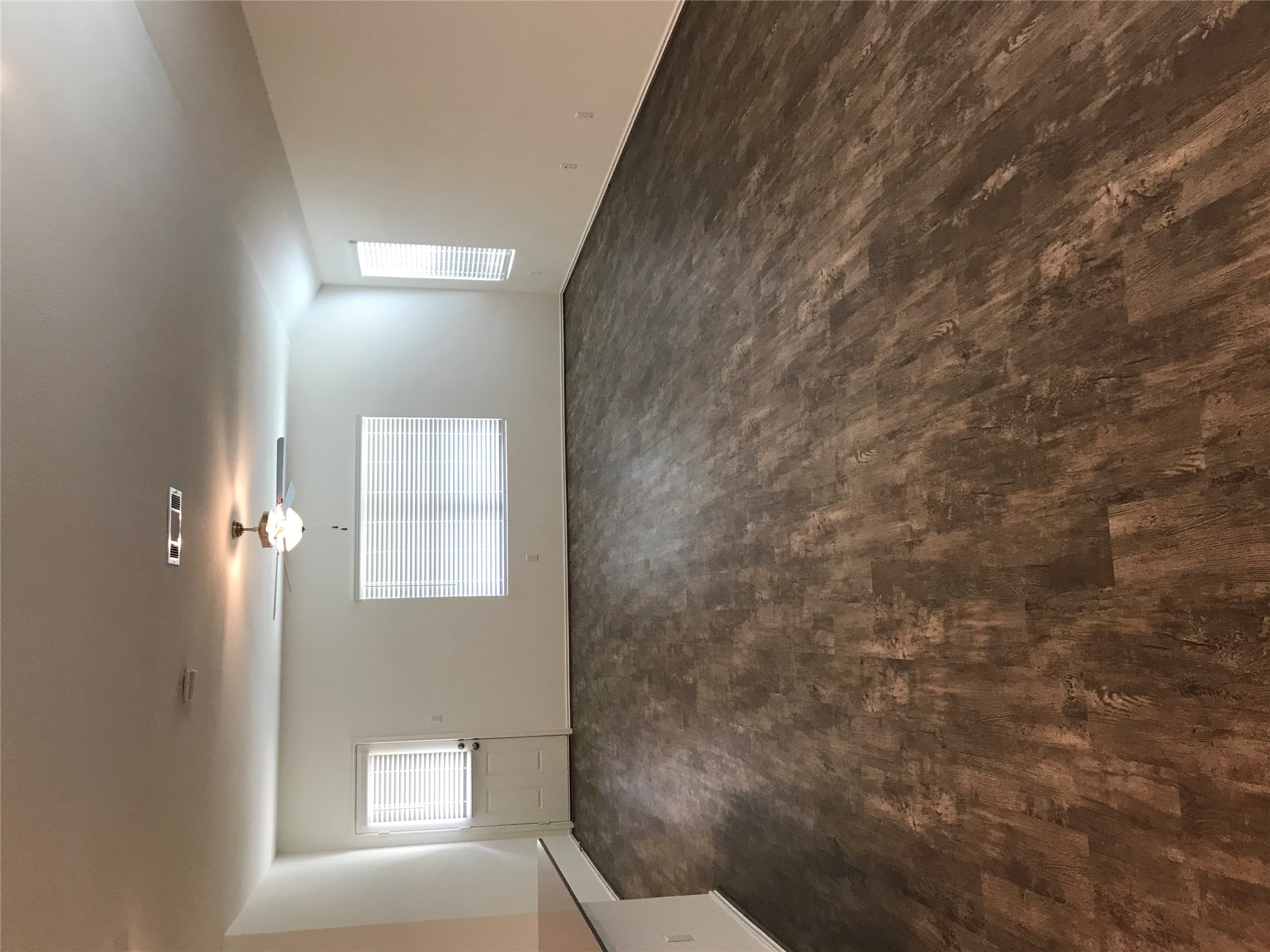 1200 Nokota Bend Georgetown, TX 78626 - Photo 32 of 39 an empty room with wooden floor and windows