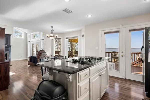 a view of walk in closet with clothes