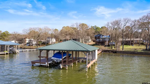 a view of a backyard of the house