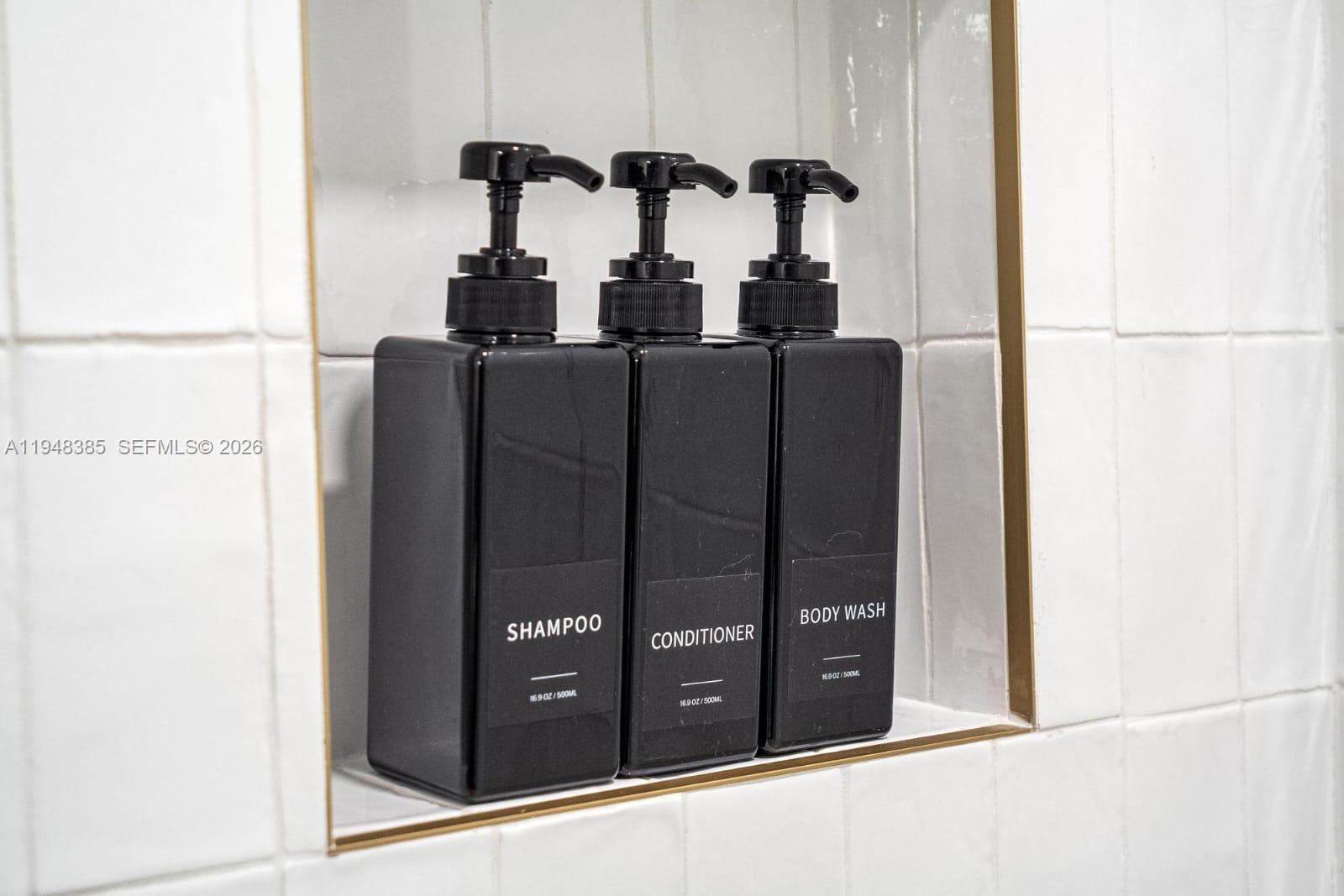 159 Northeast 6th Street, Unit 5101 Miami, FL 33132 - Photo 25 of 47 a view of a bathroom with mirror gate