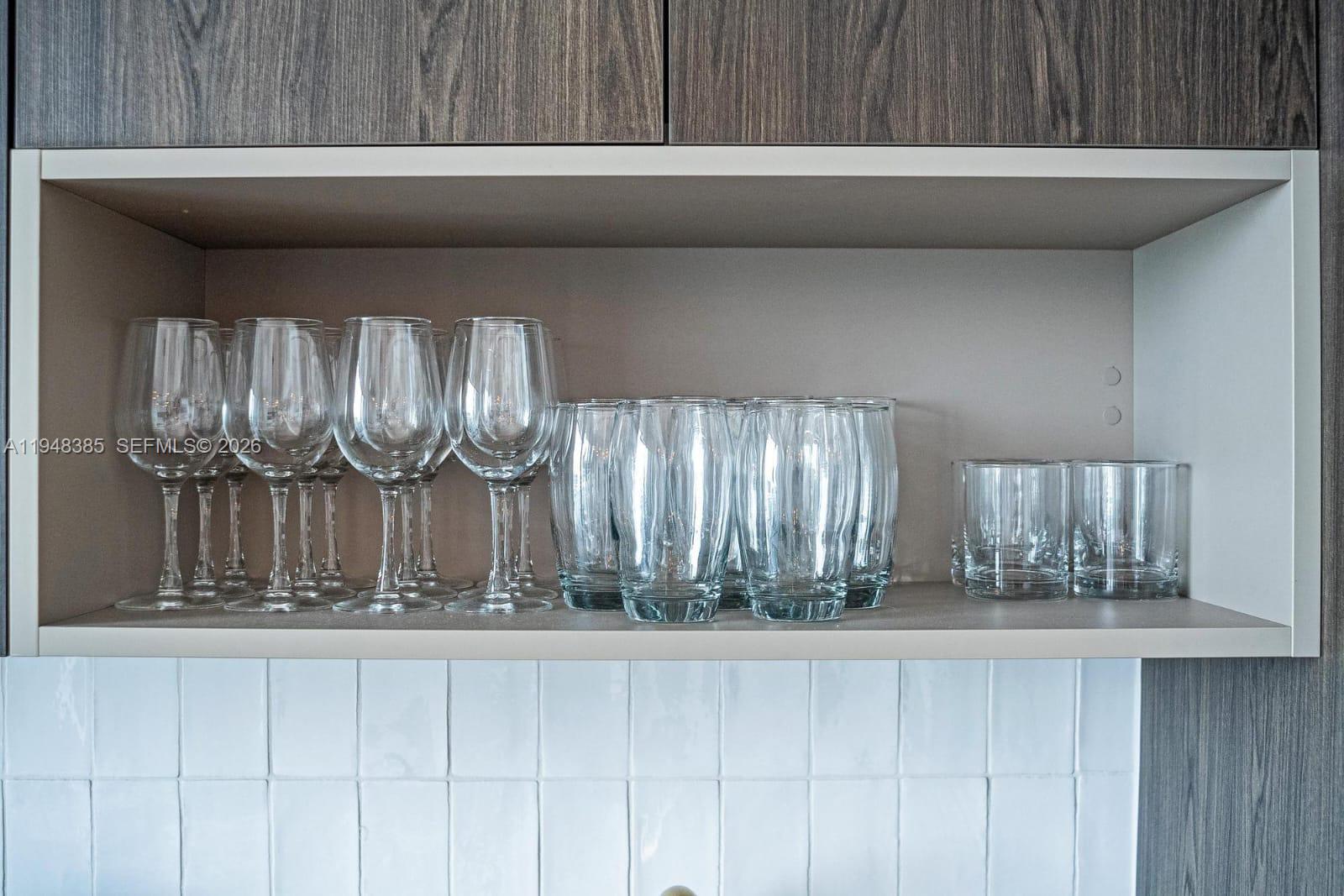 159 Northeast 6th Street, Unit 5101 Miami, FL 33132 - Photo 36 of 47 a bathroom with a sink and a mirror