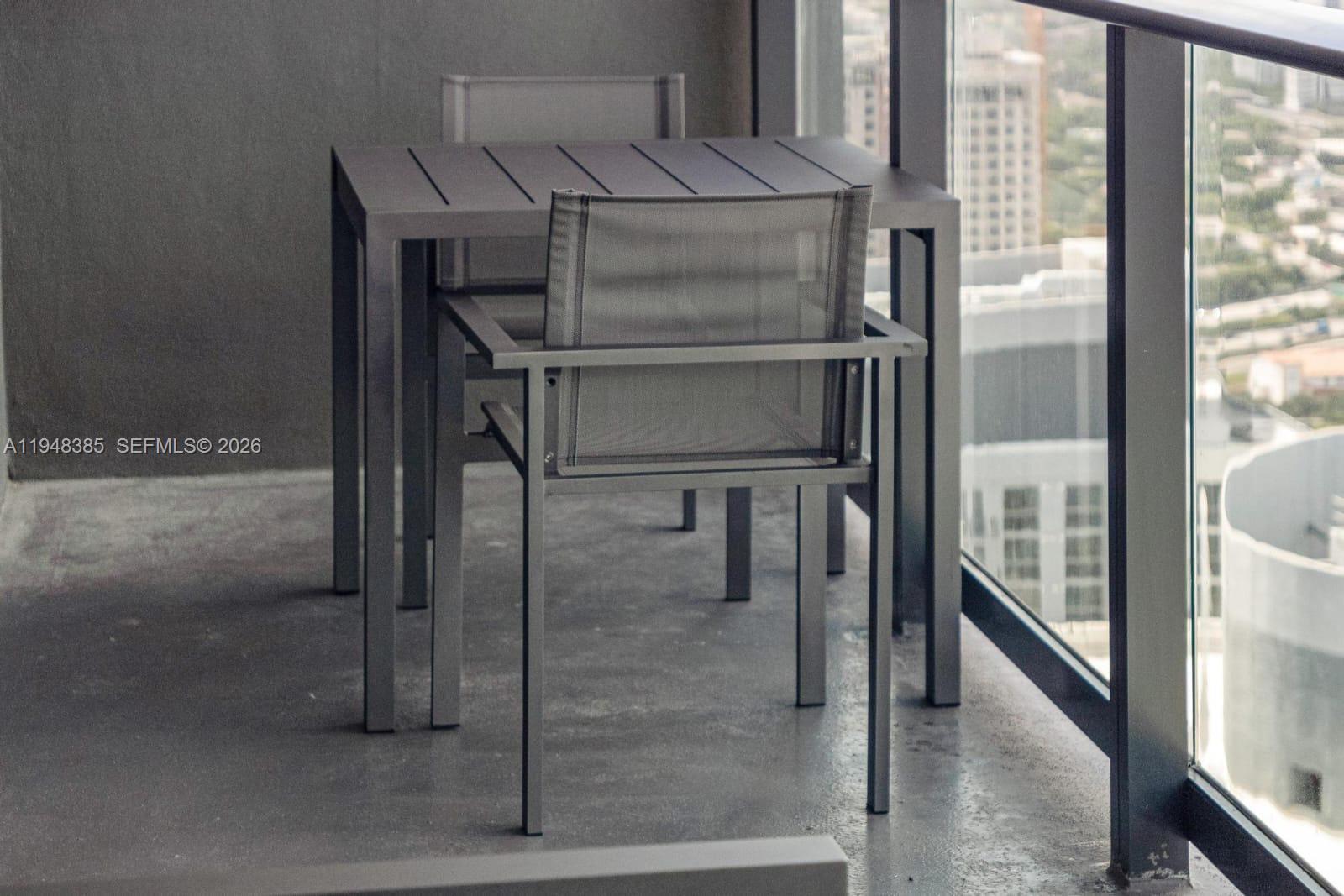 159 Northeast 6th Street, Unit 5101 Miami, FL 33132 - Photo 41 of 47 a kitchen with a glass shower door