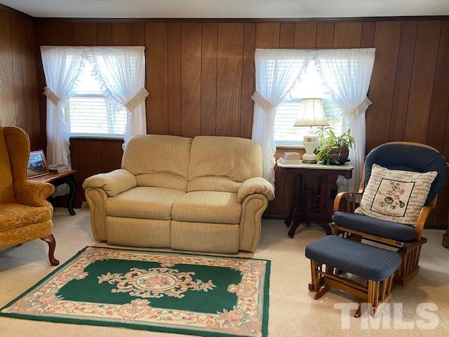 871 Halifax Road Roxboro, NC 27573 - Photo 12 of 45 a living room with furniture and a window