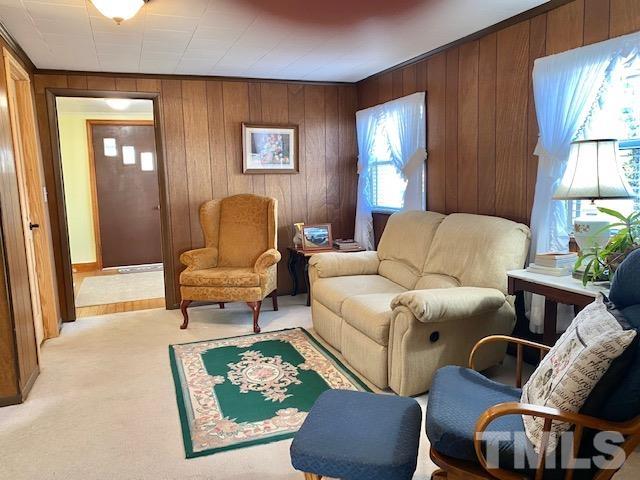 871 Halifax Road Roxboro, NC 27573 - Photo 18 of 45 a living room with furniture and a window