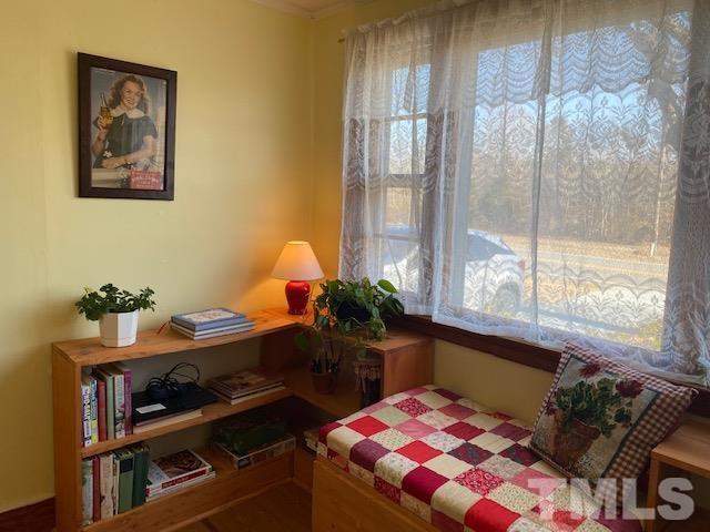 871 Halifax Road Roxboro, NC 27573 - Photo 19 of 45 a room with furniture and window