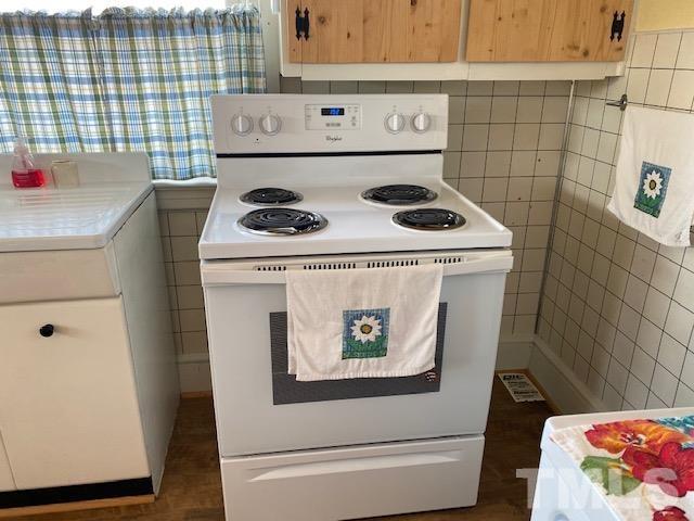 871 Halifax Road Roxboro, NC 27573 - Photo 28 of 45 a utility room with dryer and washer