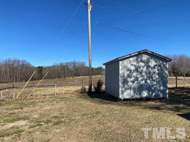 871 Halifax Road Roxboro, NC 27573 - Photo 38 of 45 a view of a backyard