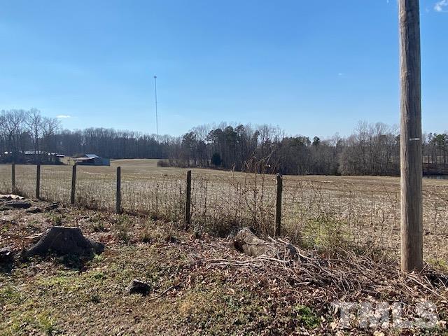 871 Halifax Road Roxboro, NC 27573 - Photo 4 of 45 a view of a lake with houses in the back