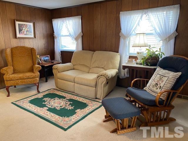871 Halifax Road Roxboro, NC 27573 - Photo 8 of 45 a living room with furniture and a window