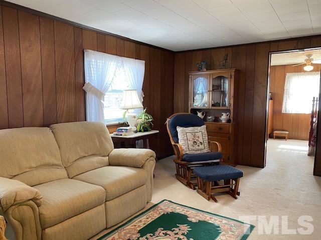 871 Halifax Road Roxboro, NC 27573 - Photo 9 of 45 a living room with furniture and a window