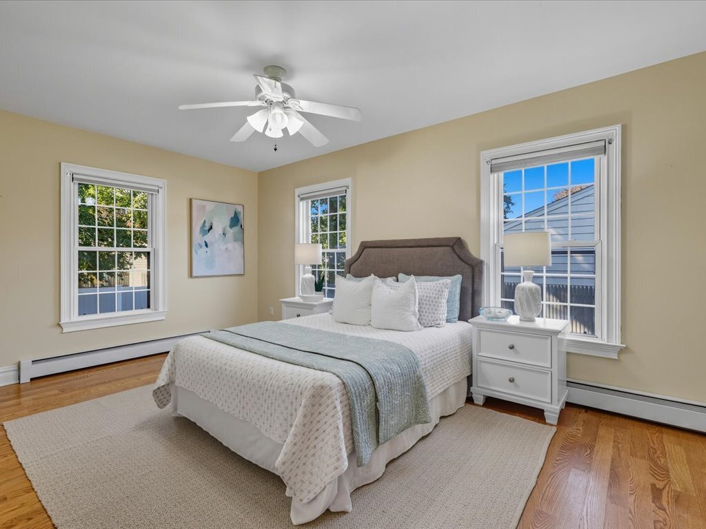 217 Huntington Road Stratford, CT 06614 - Photo 11 of 39 a bedroom with a large bed and a window