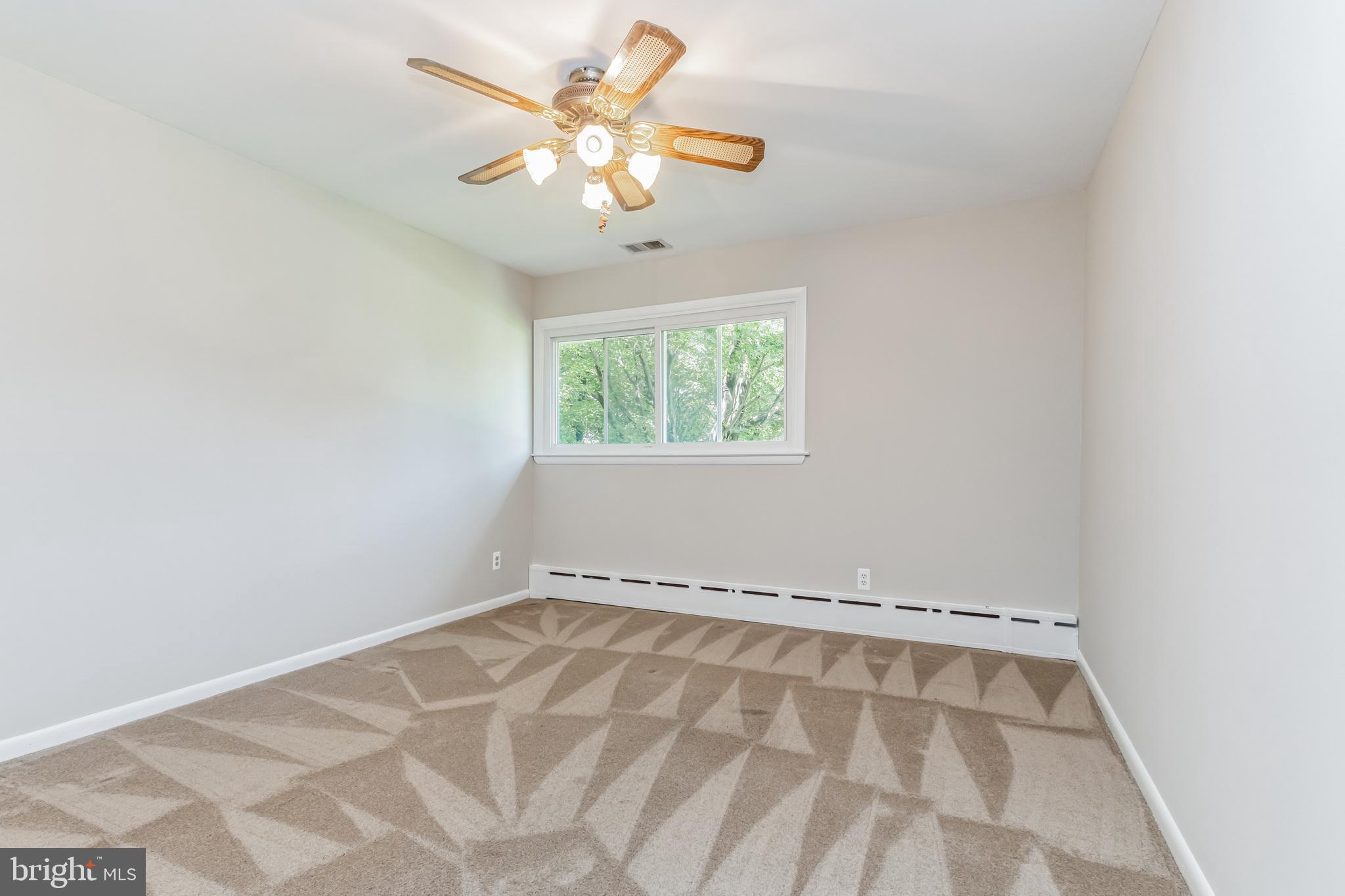 11407 Norris Drive Silver Spring, MD 20902 - Photo 16 of 37 Bedroom #3 on main level- hardwoods under carpet
