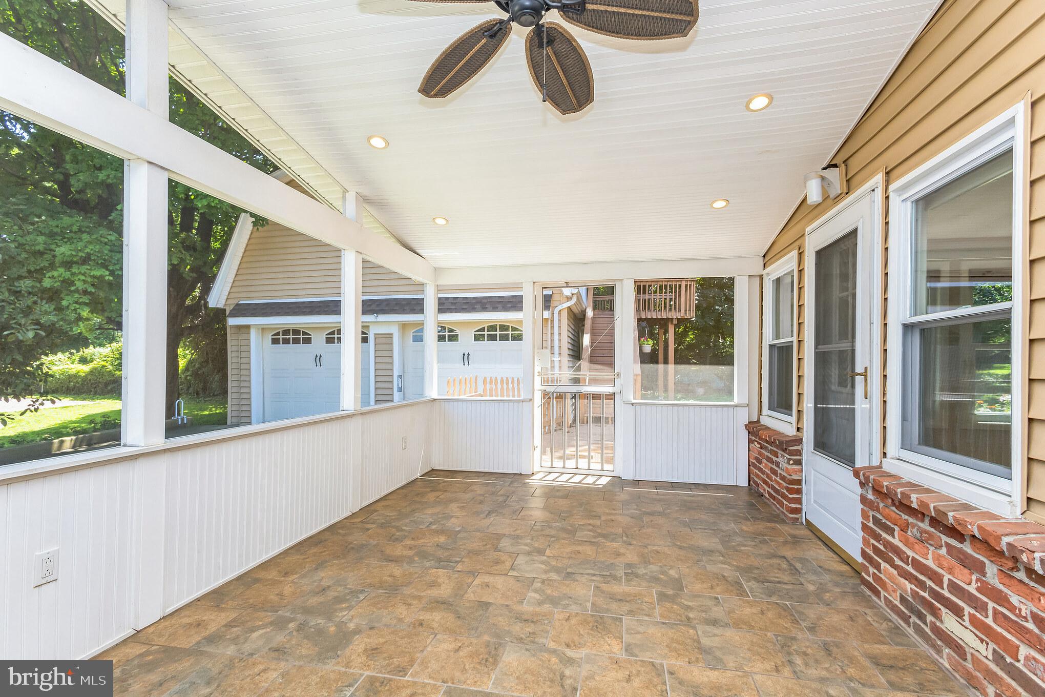 11407 Norris Drive Silver Spring, MD 20902 - Photo 27 of 37 Screened in porch with ceramic tile flooring