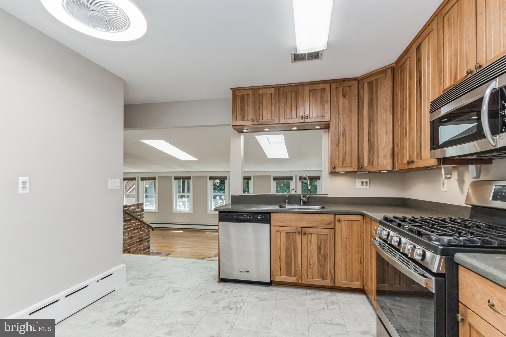 11407 Norris Drive Silver Spring, MD 20902 - Photo 9 of 37 Kitchen opens to the addition and dining room