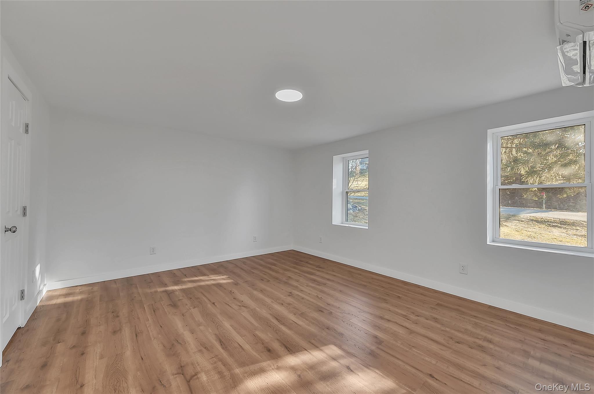 67 Jacobs Road Westtown, NY 10998 - Photo 29 of 36 Empty room featuring light wood-style flooring and baseboards