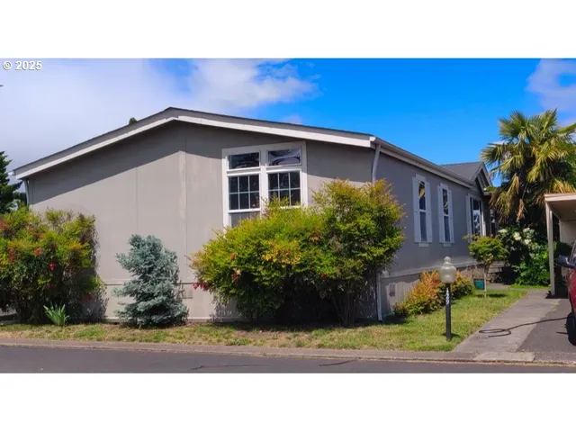 a black and white photo of a house