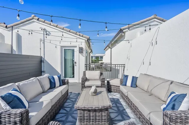 a balcony with furniture