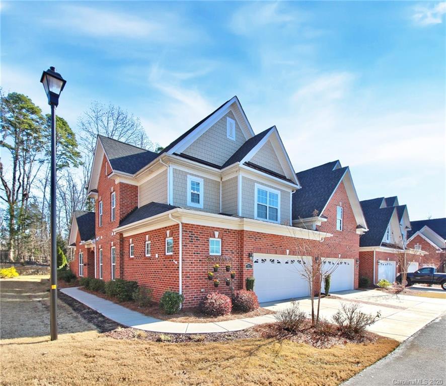 911 Ospre Lane Fort Mill, SC 29708 - Photo 2 of 45 a front view of a house with entertaining space