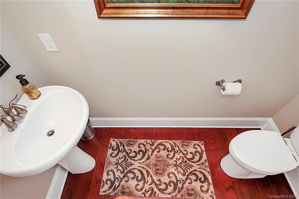 911 Ospre Lane Fort Mill, SC 29708 - Photo 17 of 45 a bathroom with a sink and a mirror