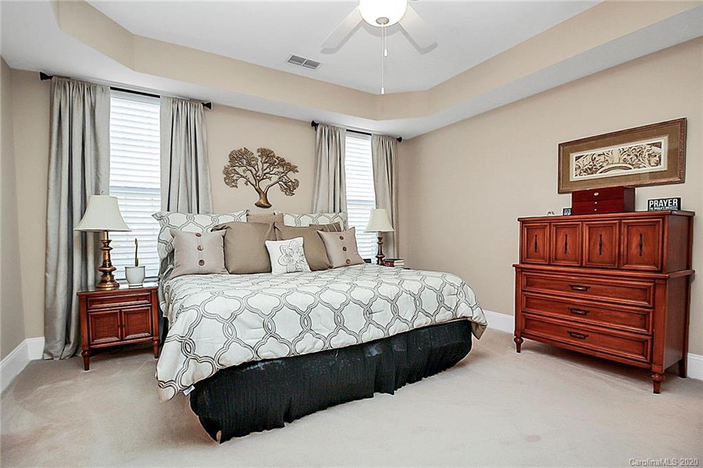 911 Ospre Lane Fort Mill, SC 29708 - Photo 19 of 45 a bedroom with a bed and window