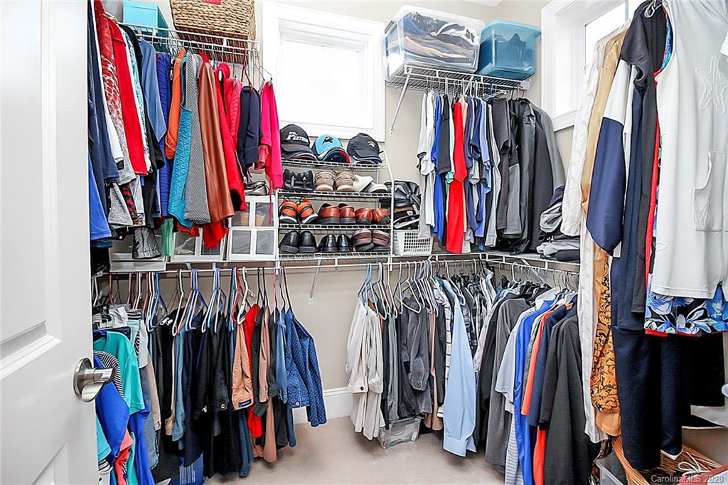 911 Ospre Lane Fort Mill, SC 29708 - Photo 23 of 45 a view of walk in closet with clothes