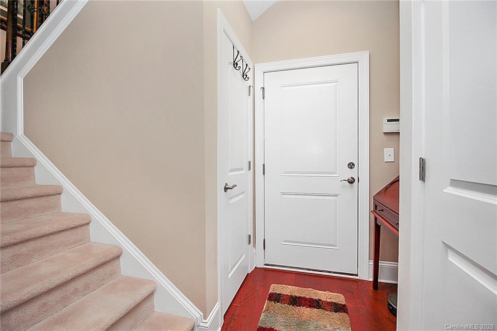 911 Ospre Lane Fort Mill, SC 29708 - Photo 24 of 45 a view of walk in closet with wooden floor