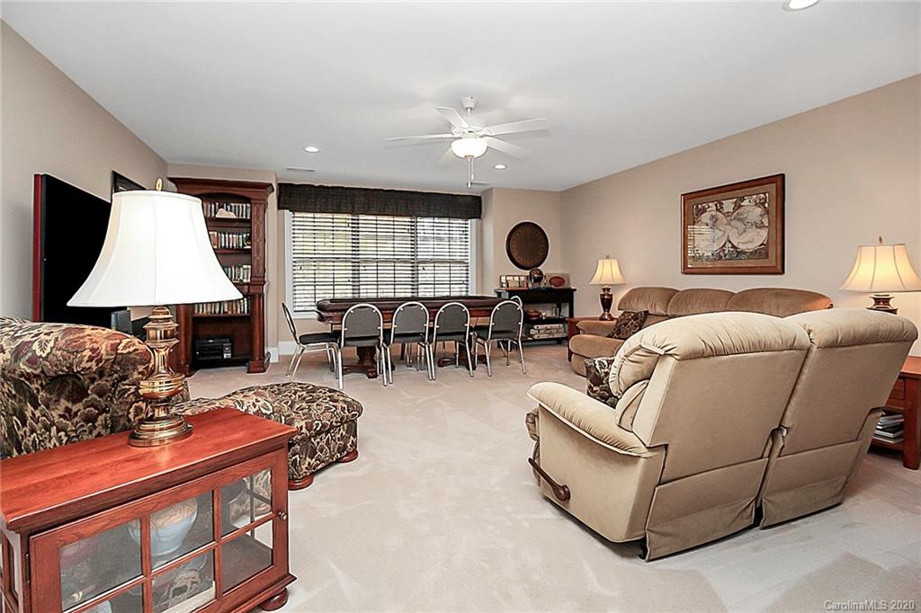 911 Ospre Lane Fort Mill, SC 29708 - Photo 26 of 45 a living room with furniture and a large window