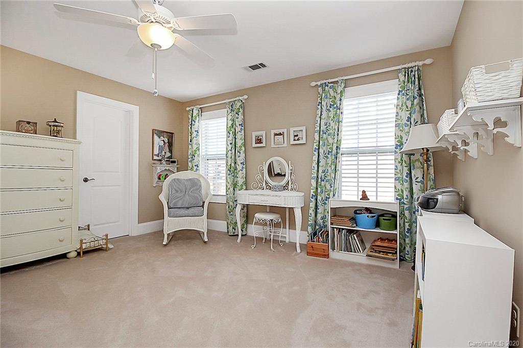 911 Ospre Lane Fort Mill, SC 29708 - Photo 31 of 45 a living room with furniture and a fireplace