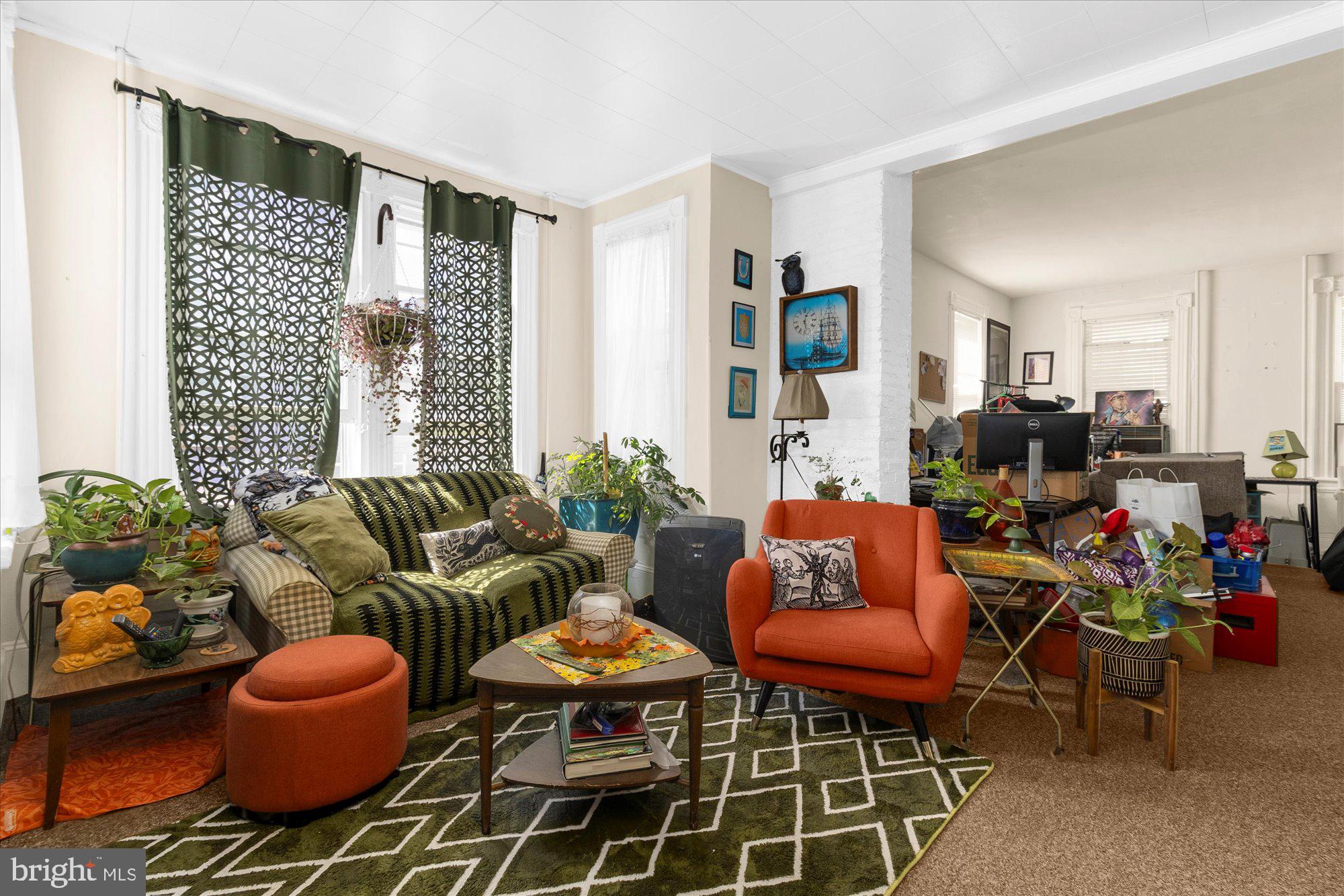 40 Union Street Mount Holly, NJ 08060 - Photo 17 of 41 a living room with furniture a rug and a window