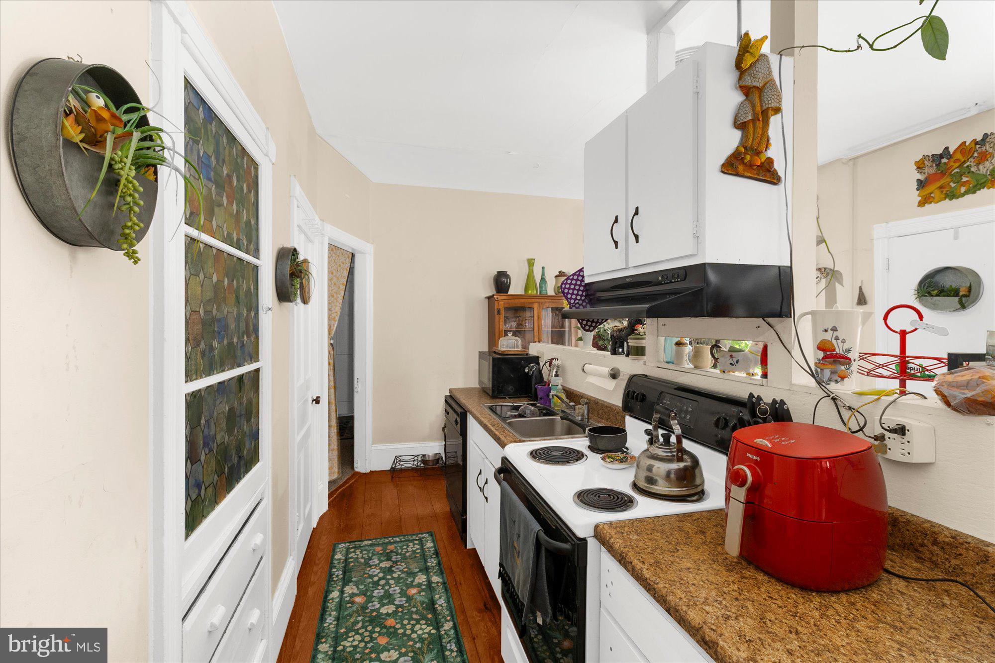 40 Union Street Mount Holly, NJ 08060 - Photo 20 of 41 a kitchen with a stove and a wooden floor