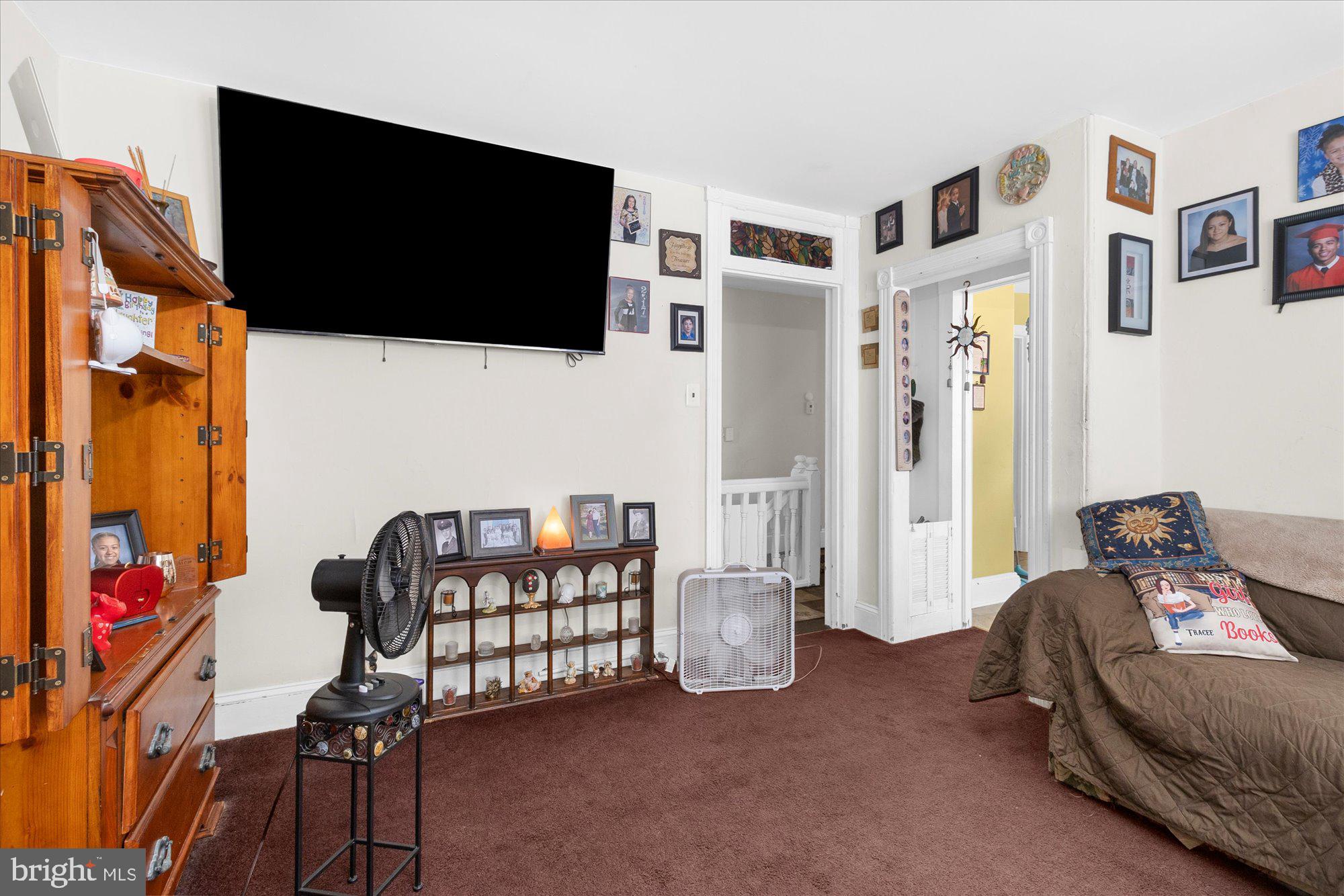 40 Union Street Mount Holly, NJ 08060 - Photo 40 of 41 a bedroom with furniture and a flat screen tv