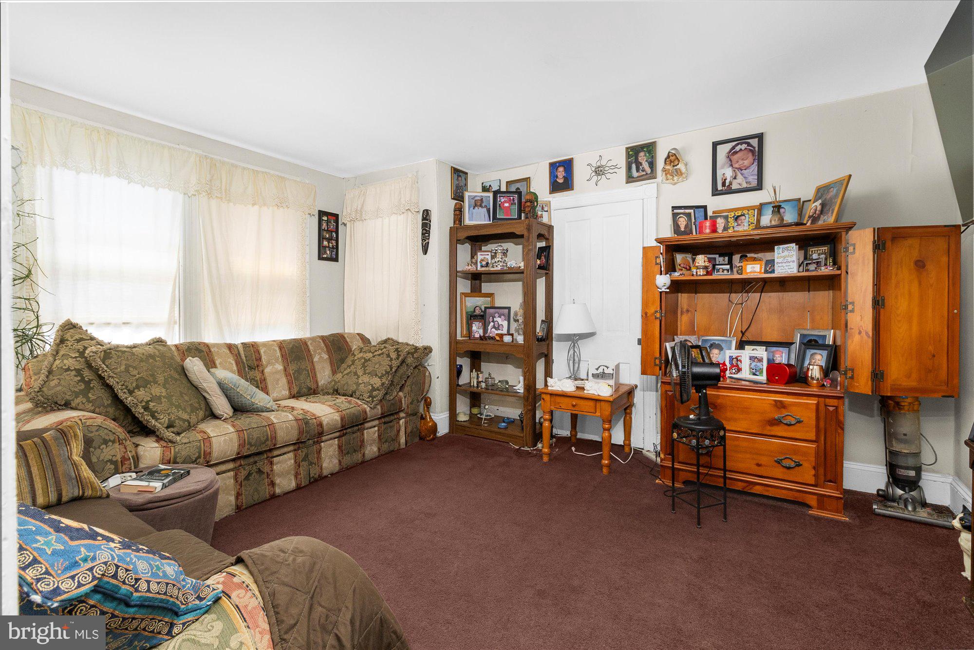 40 Union Street Mount Holly, NJ 08060 - Photo 41 of 41 a living room with furniture and a book shelf
