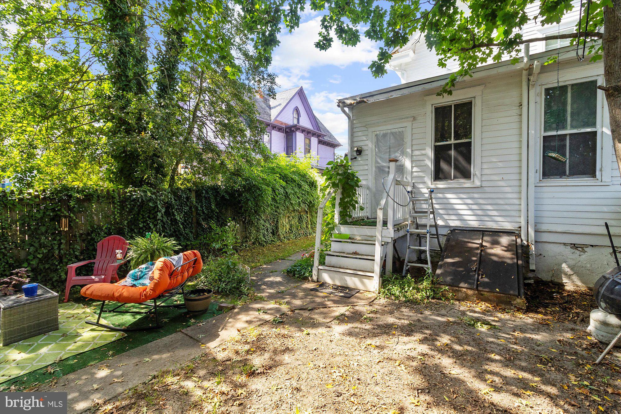 40 Union Street Mount Holly, NJ 08060 - Photo 9 of 41 a backyard of a house with barbeque oven and outdoor seating
