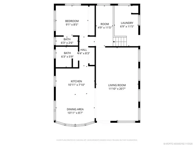 a picture of a bench in front of a wall