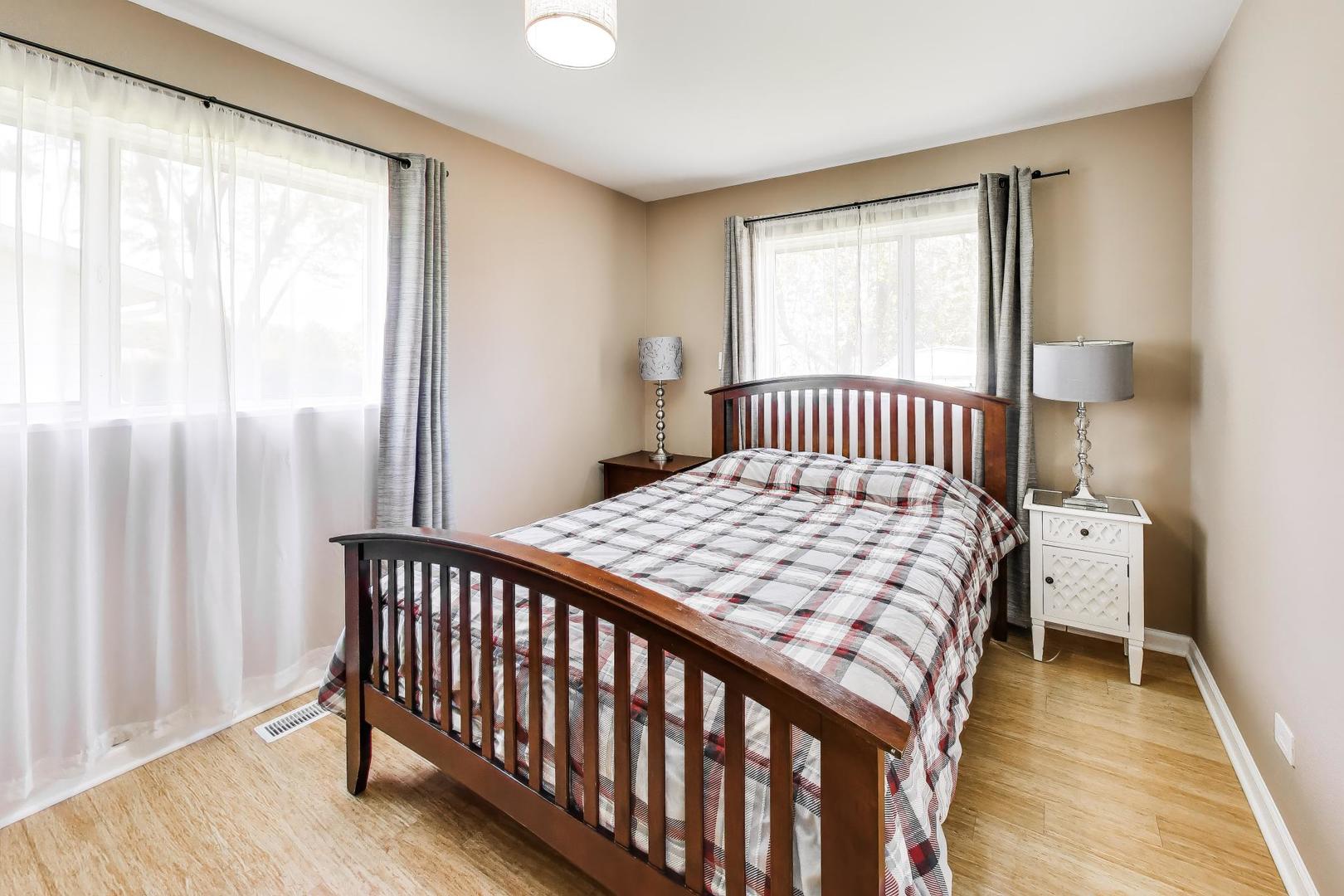 420 Bode Road Hoffman Estates, IL 60169 - Photo 11 of 20 a bedroom with a bed and a window