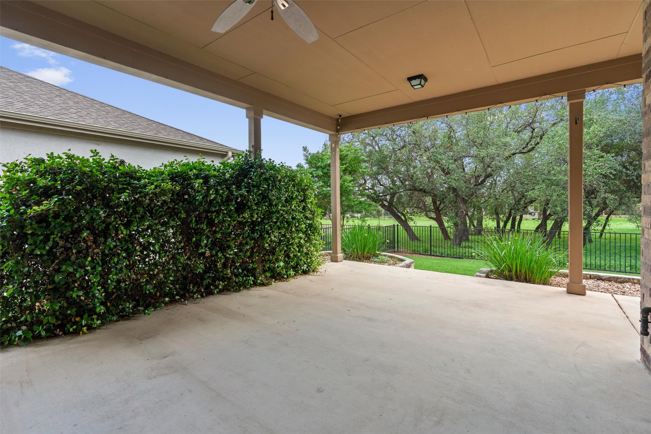 108 Calhoun Lane Georgetown, TX 78633 - Photo 28 of 32 a view of a garden with a patio