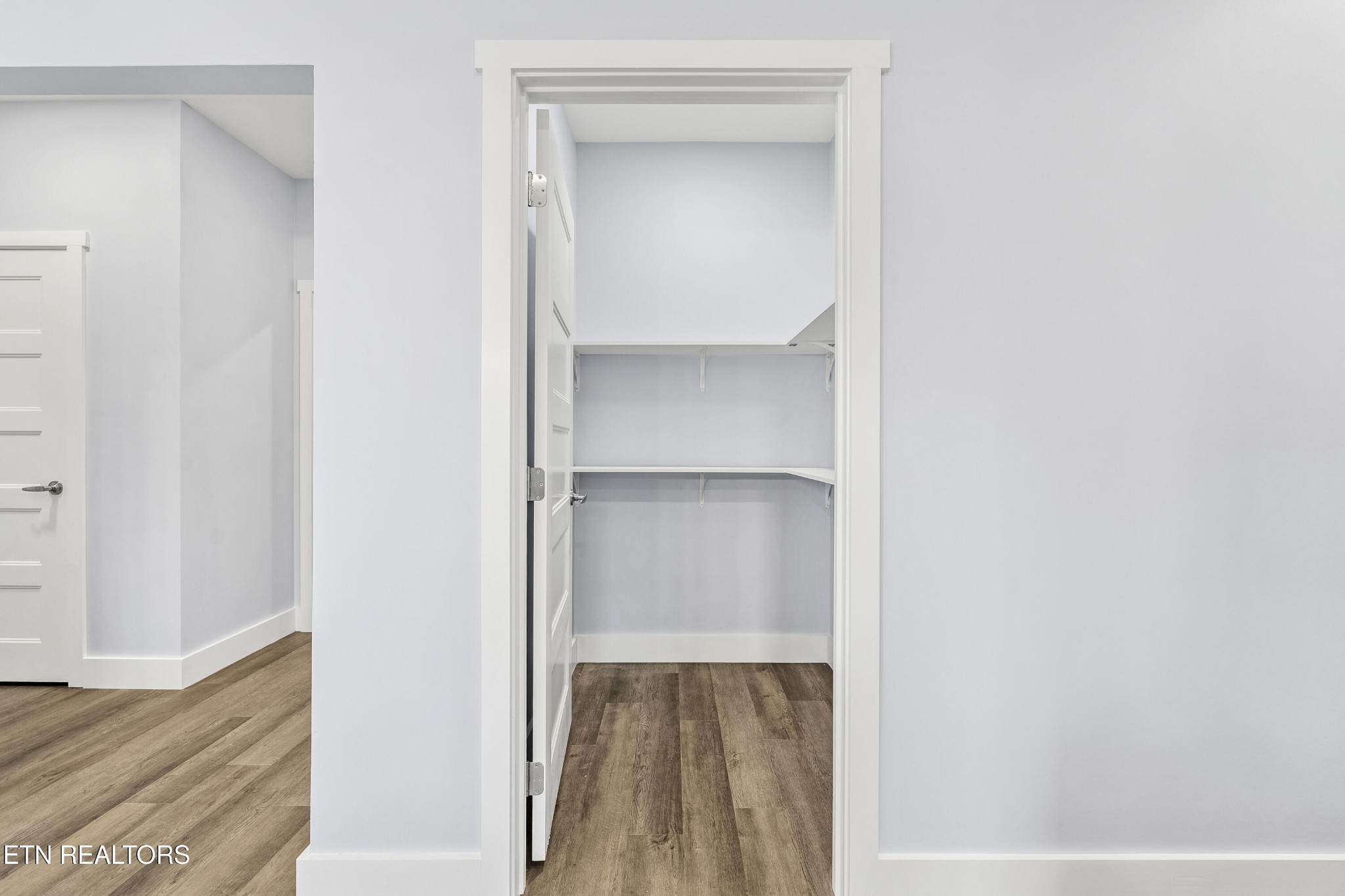 3436 Gap Road Knoxville, TN 37921 - Photo 13 of 25 a view of walk in closet with wooden floor