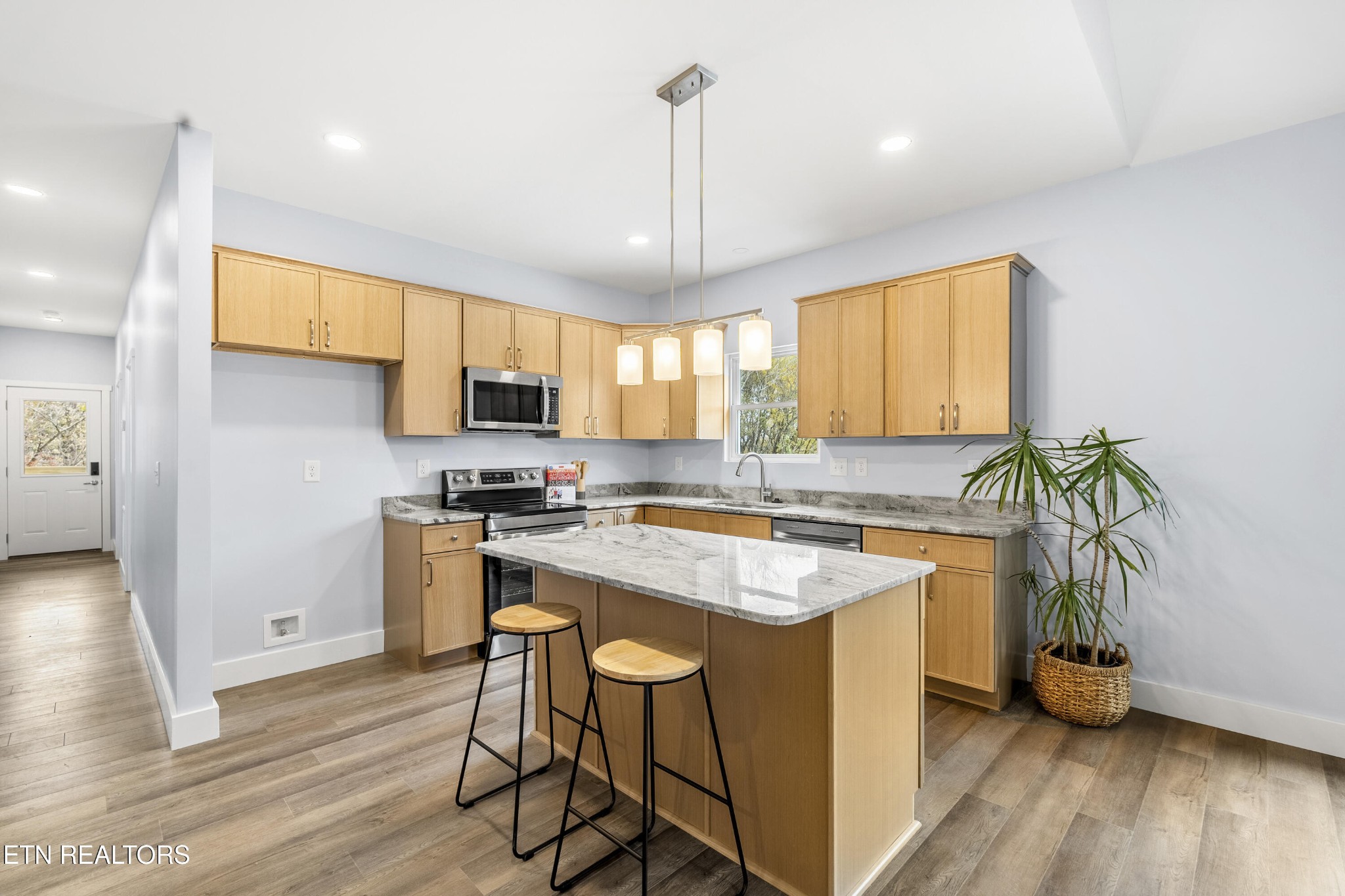 3436 Gap Road Knoxville, TN 37921 - Photo 9 of 25 a kitchen with appliances a sink a window and cabinets