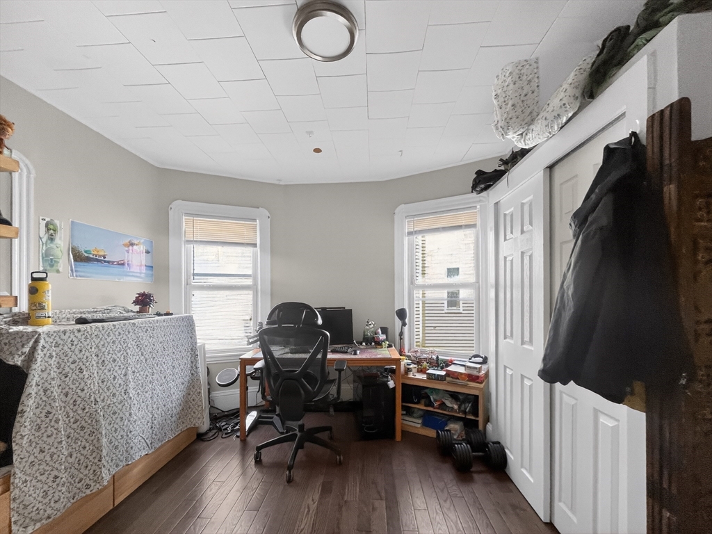 49 Porter Street Somerville, MA 02143 - Photo 20 of 40 a work room with furniture and a window