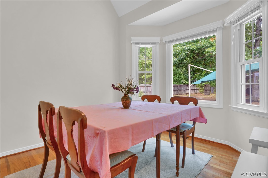 7531 Genuine Risk Lane Midlothian, VA 23112 - Photo 20 of 50 a dining room with furniture and window