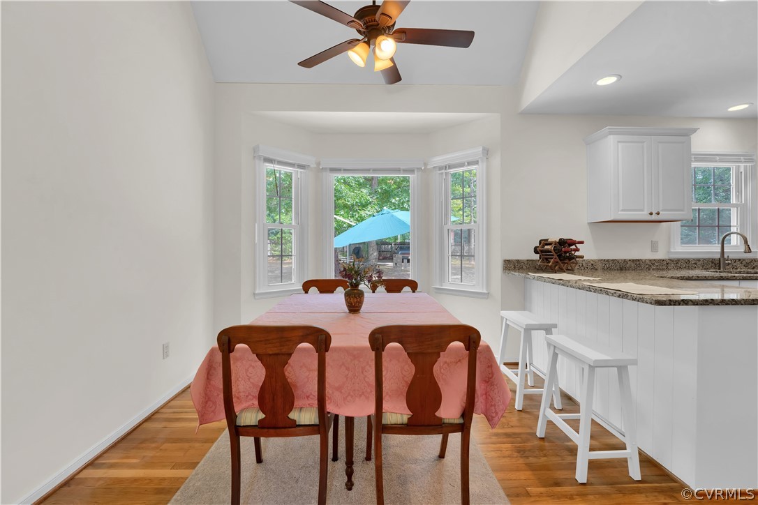 7531 Genuine Risk Lane Midlothian, VA 23112 - Photo 21 of 50 a view of a dining room with furniture window and outside view