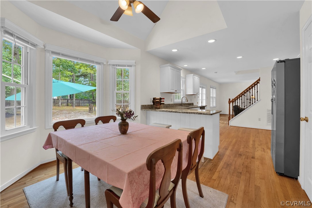 7531 Genuine Risk Lane Midlothian, VA 23112 - Photo 22 of 50 a view of a dining room with furniture and wooden floor