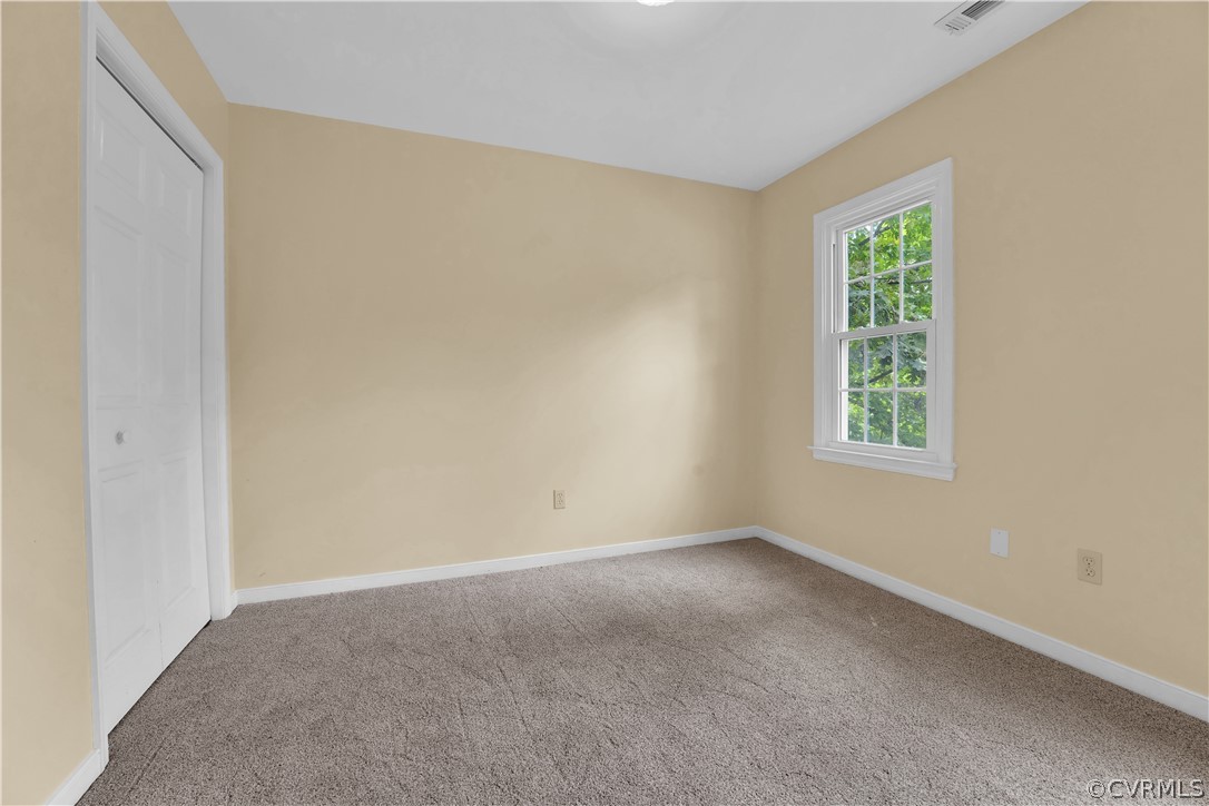 7531 Genuine Risk Lane Midlothian, VA 23112 - Photo 35 of 50 an empty room with windows