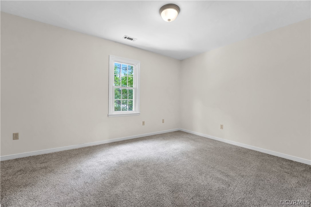 7531 Genuine Risk Lane Midlothian, VA 23112 - Photo 38 of 50 an empty room with a window