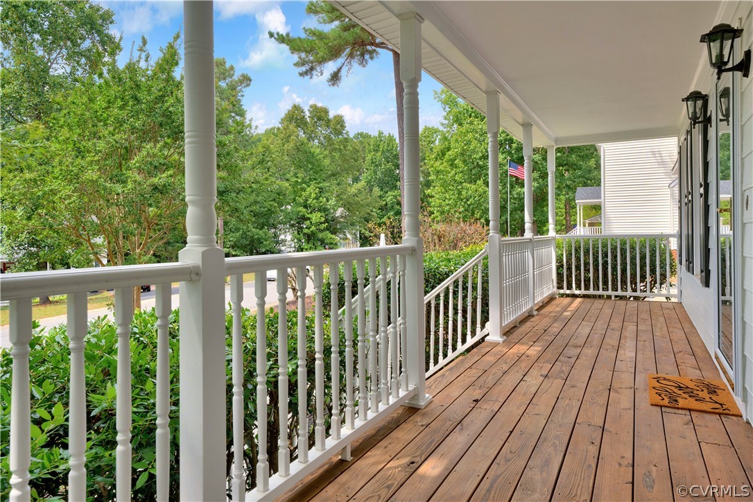 7531 Genuine Risk Lane Midlothian, VA 23112 - Photo 4 of 50 a view of a wooden deck with a yard