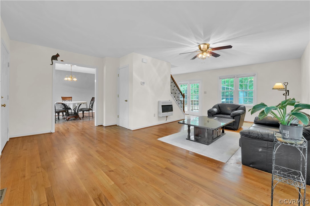 7531 Genuine Risk Lane Midlothian, VA 23112 - Photo 6 of 50 a view of a livingroom with furniture and a table