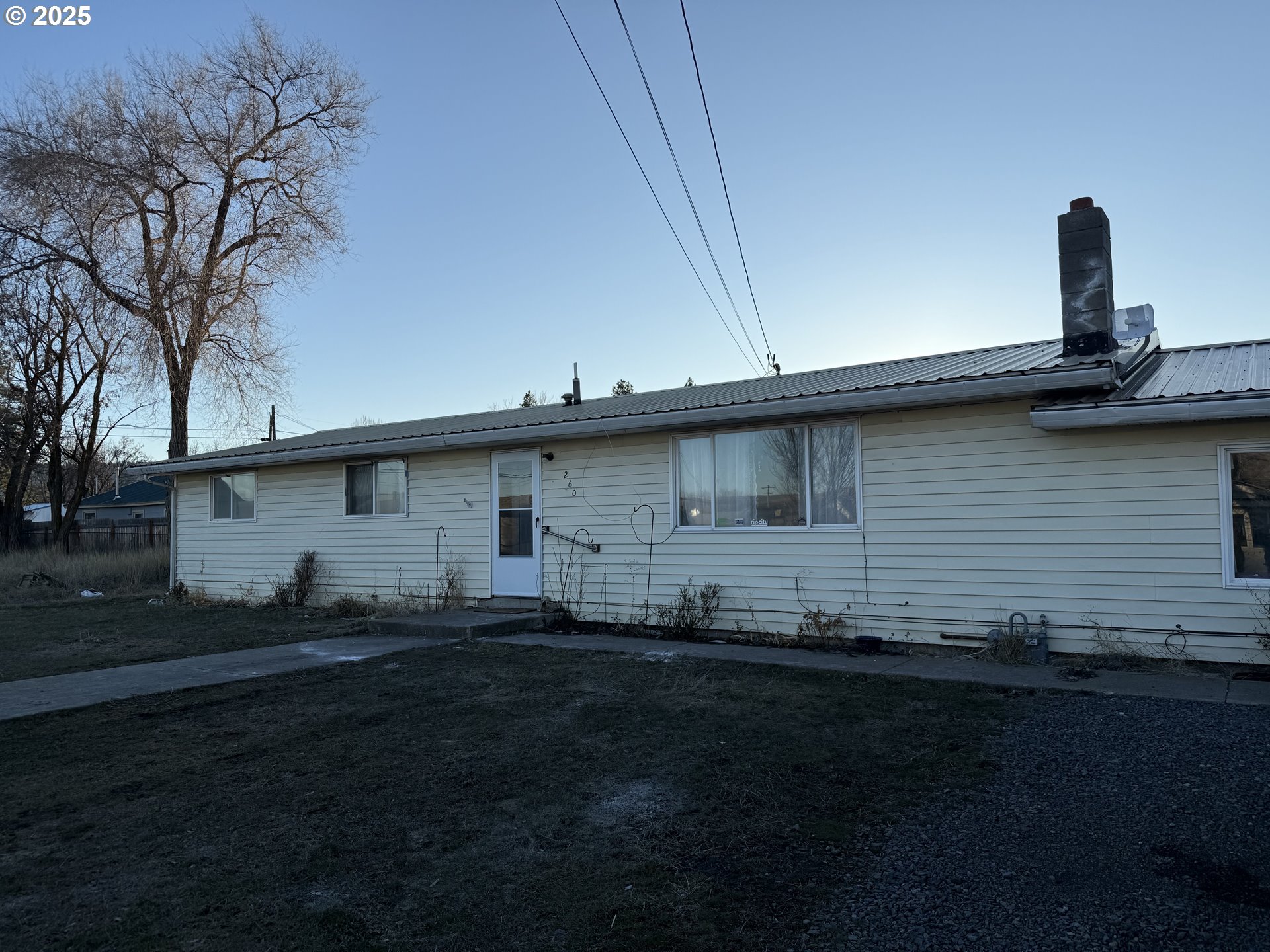 260 North 13th Street Elgin, OR 97827 - Photo 13 of 13 a front view of a house with yard