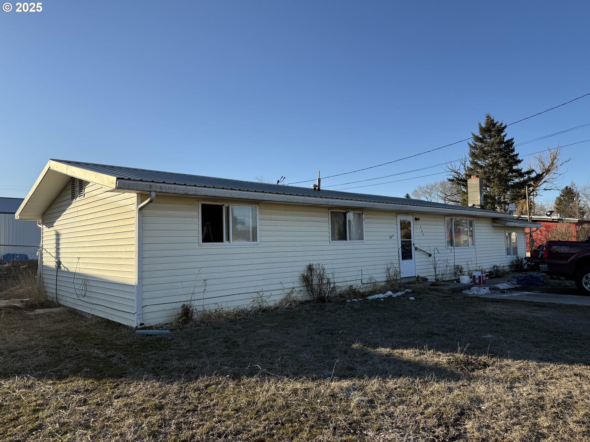 260 North 13th Street Elgin, OR 97827 - Photo 2 of 13 a view of a house with backyard