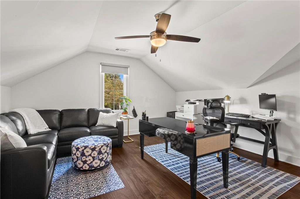 53 Maple Street Roswell, GA 30075 - Photo 28 of 59 a living room with furniture and a window