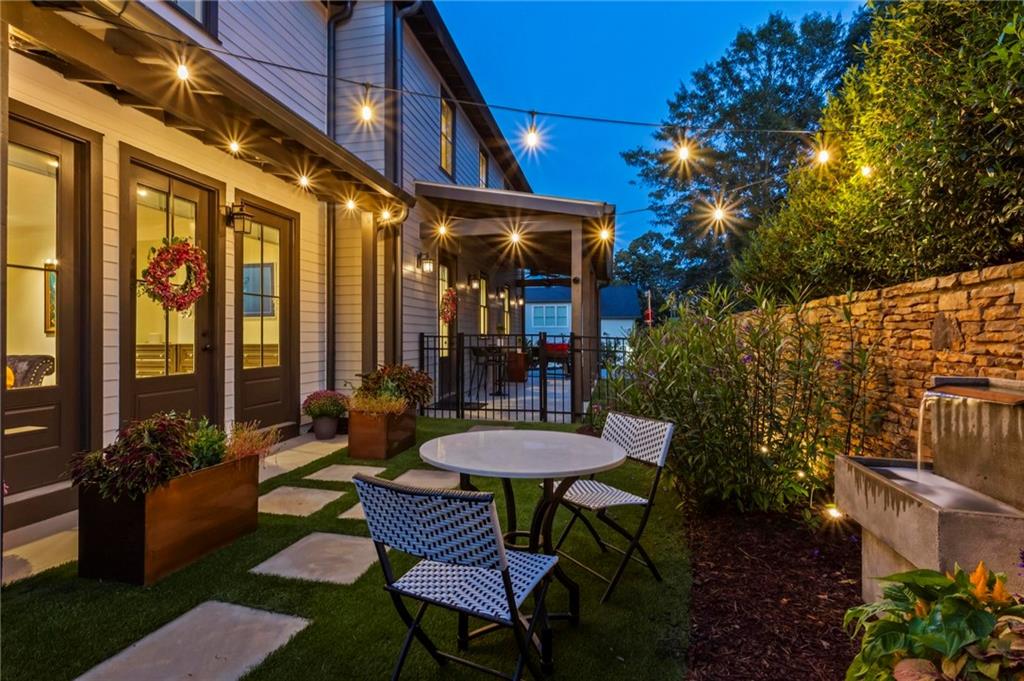 53 Maple Street Roswell, GA 30075 - Photo 47 of 59 a view of a chairs and table in the patio